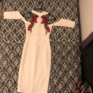 White dress with red roses